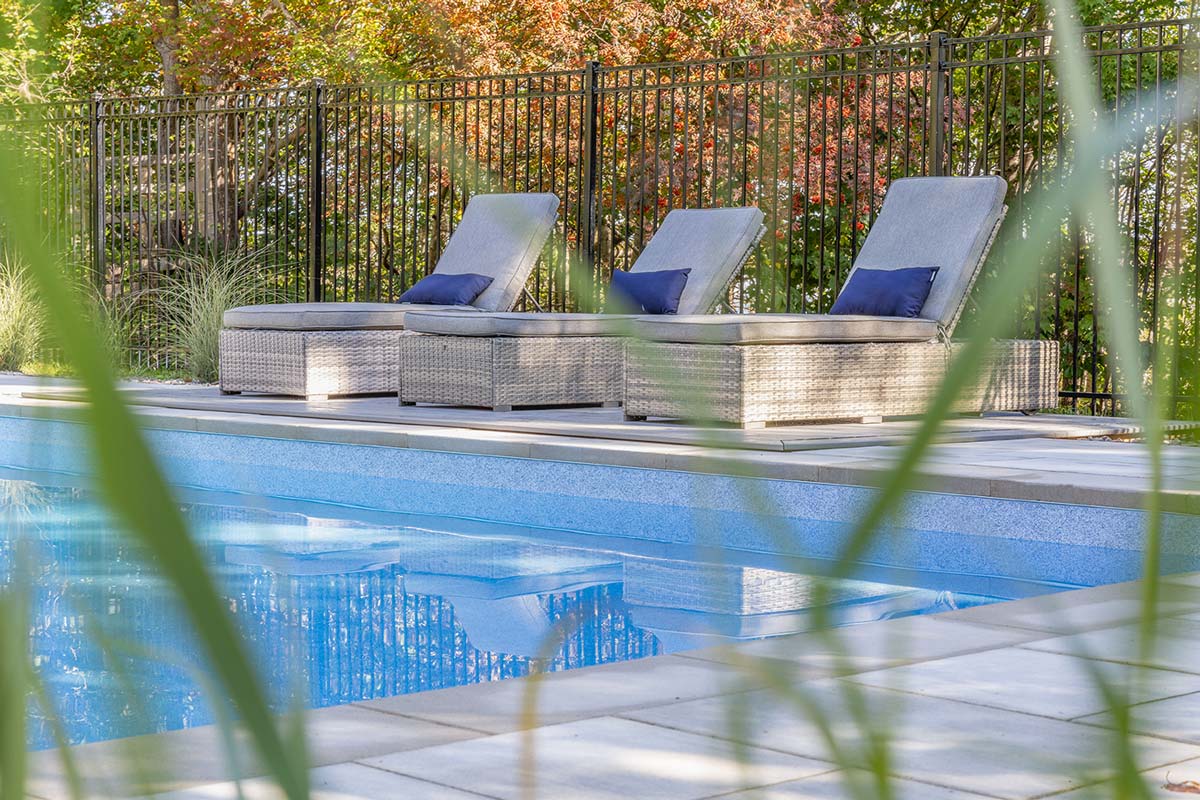 family, family enjoying pool, pool facility, pool ladders, pool details